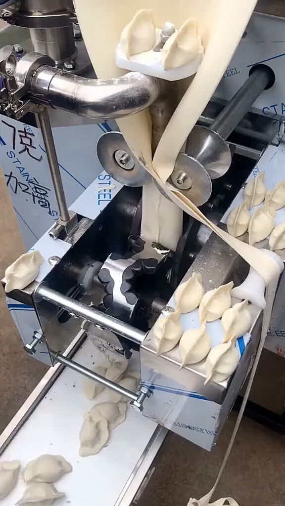 机器包饺子太快了!
