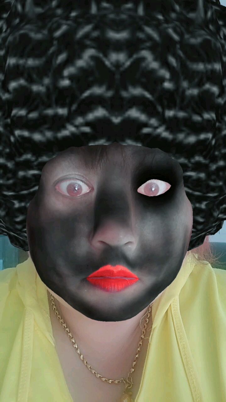 哈哈,炸成黑人了