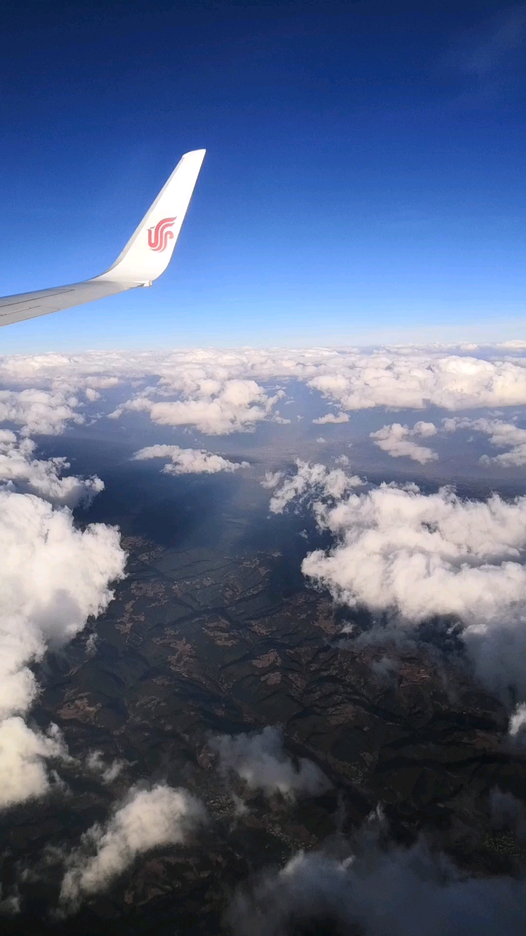 五一出游记#飞机在云彩上面,好漂亮啊.