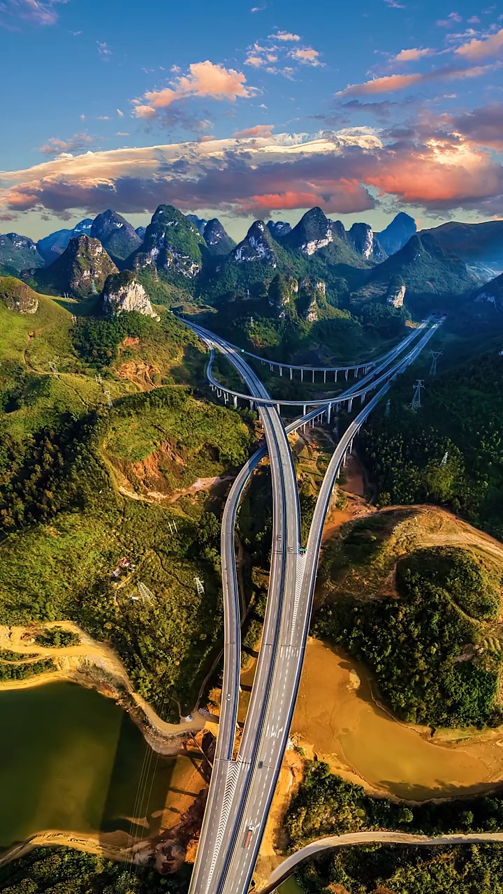 像这样的路在中国还有很多很多,我们逢山开路,遇水架桥,谁都不能阻挡