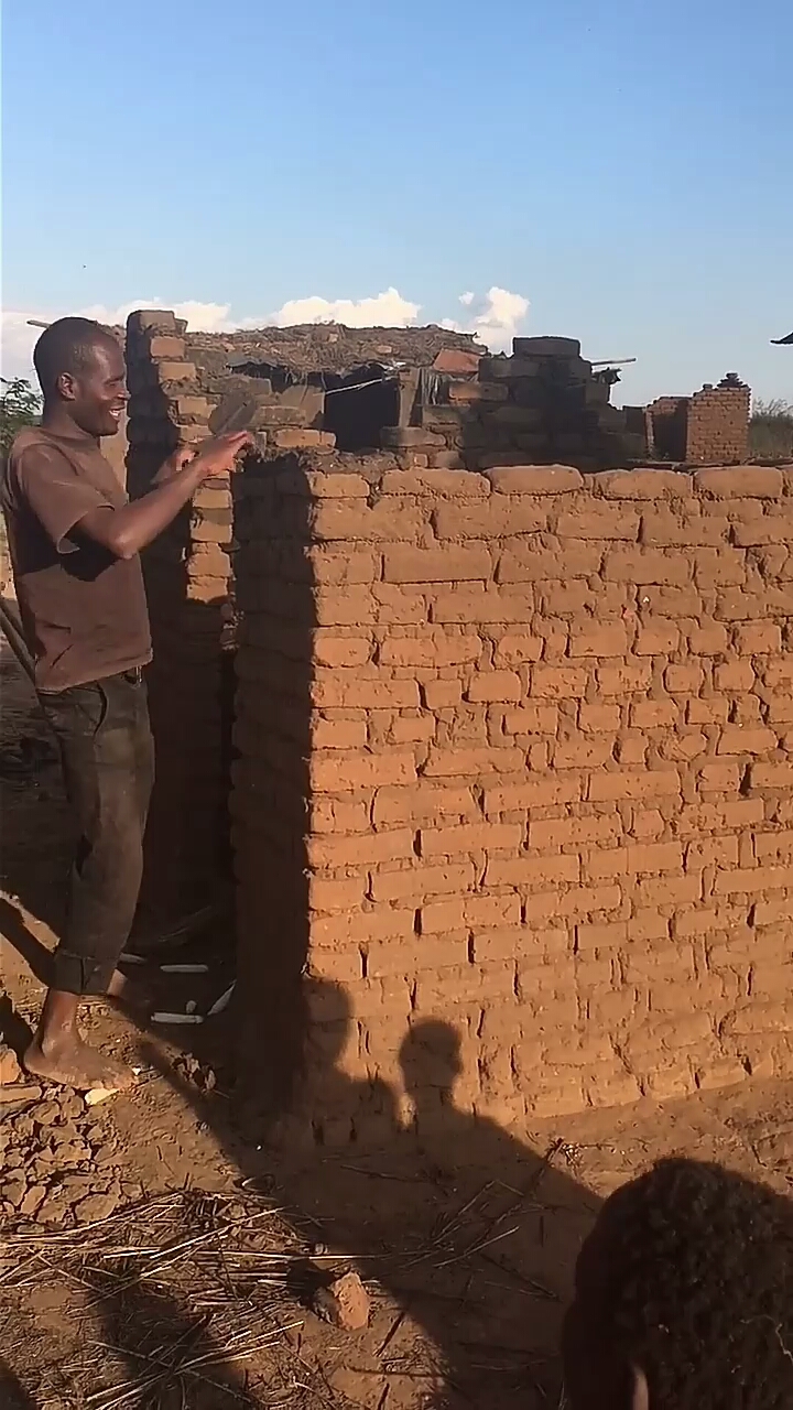 非洲人盖房子图片