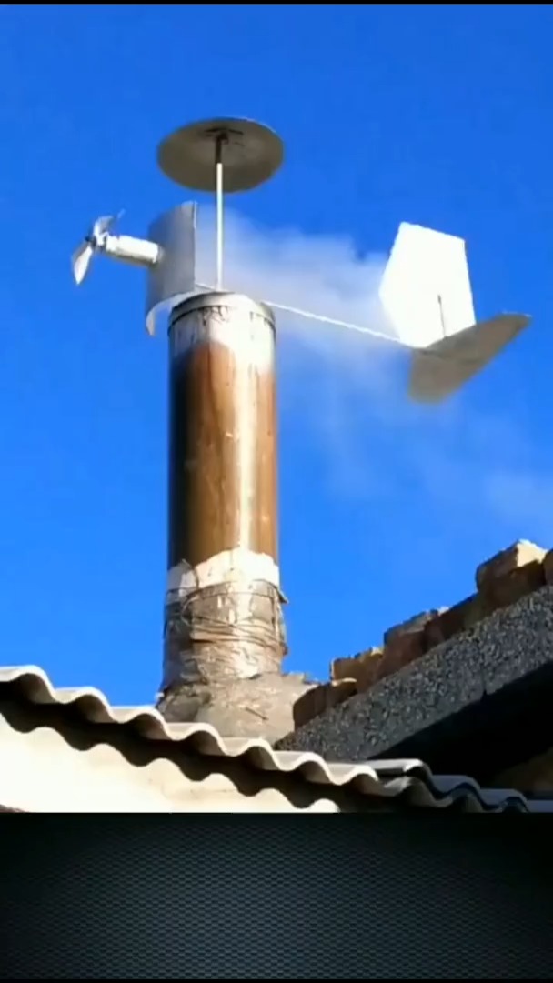 给老家的烟筒安装上挡风器解决了阴天下雨倒烟的难题