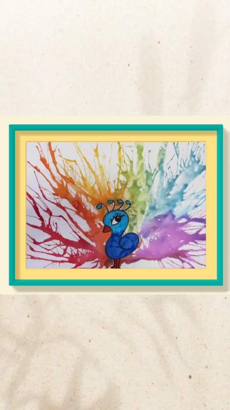 画画原来如此简单#滴上颜料,用吸管吹一吹,一只七彩的孔雀就出来啦