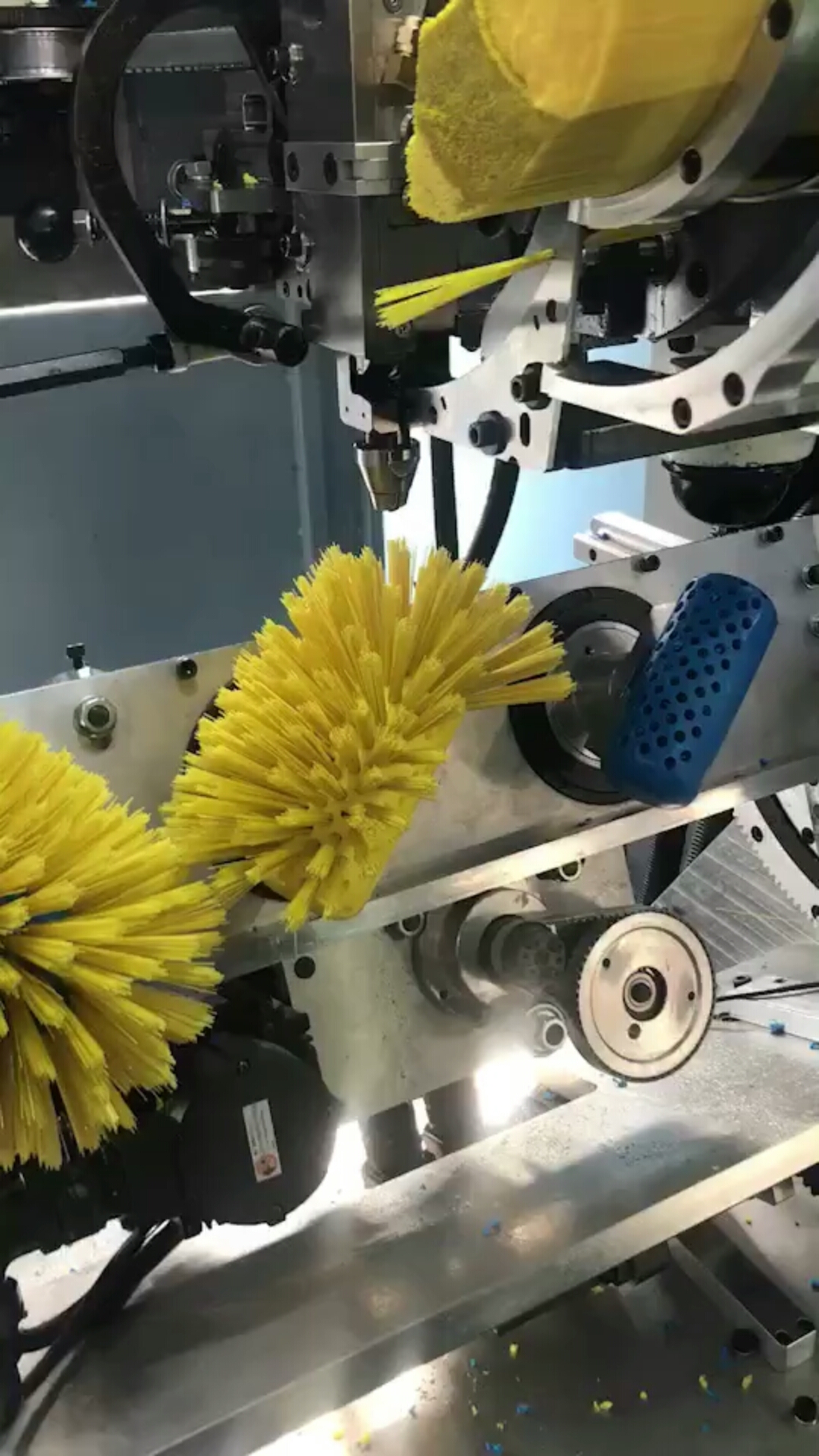 牙刷植毛机一个原理