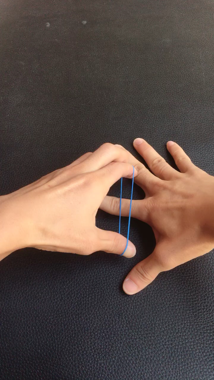 春晚魔术教学之橡皮筋穿透手指