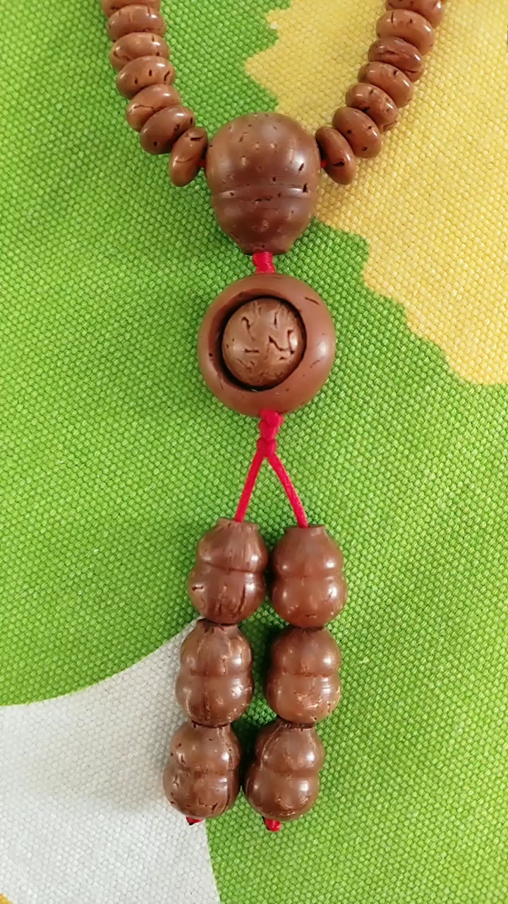 桃核飞碟片脖挂