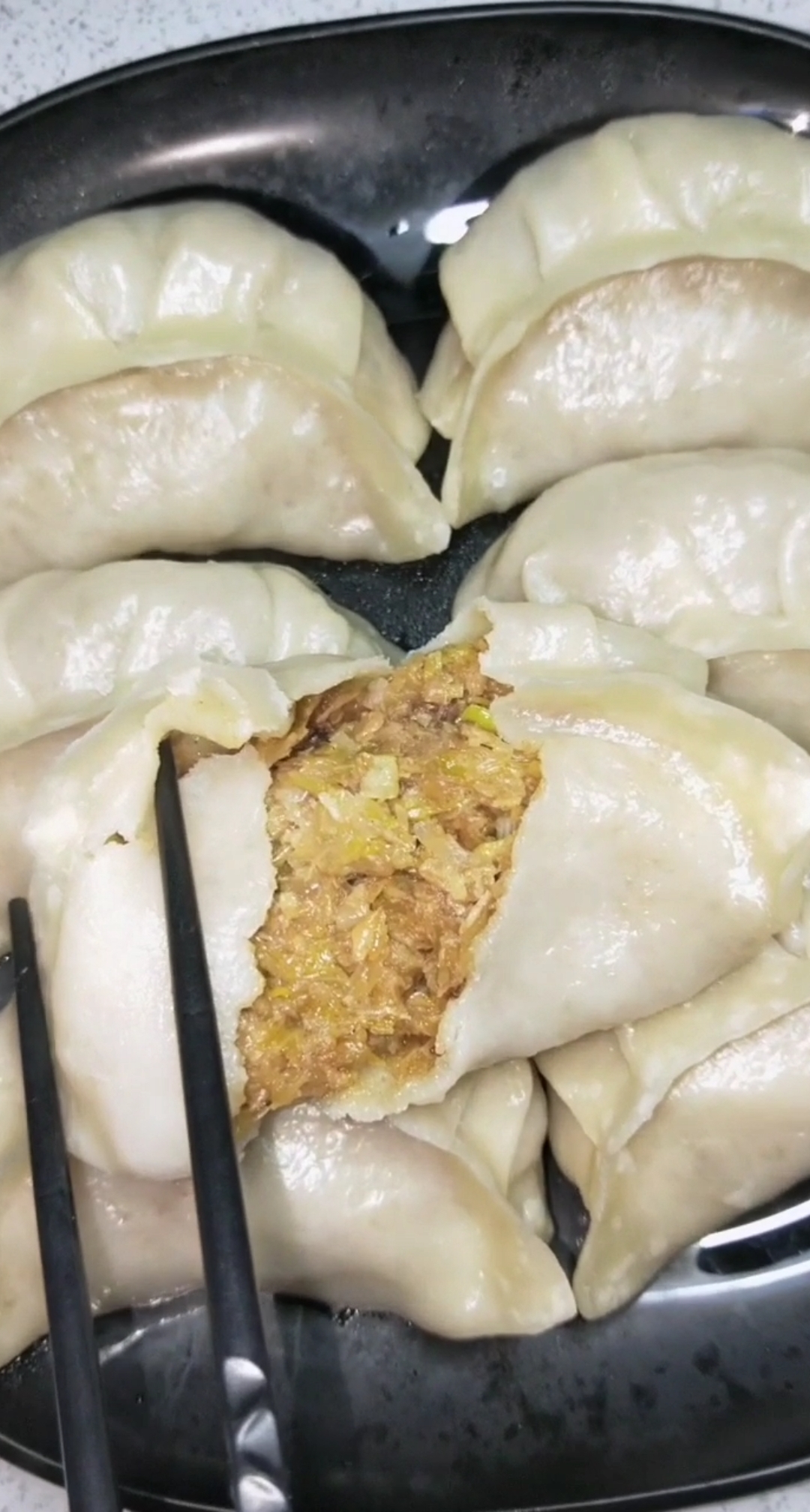 东北菜#酸菜馅大蒸饺皮薄馅大