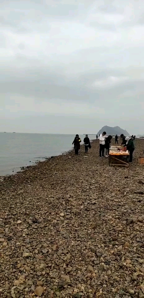 辽宁省锦州市笔架山笔架天桥,落潮是条路,涨潮是大海