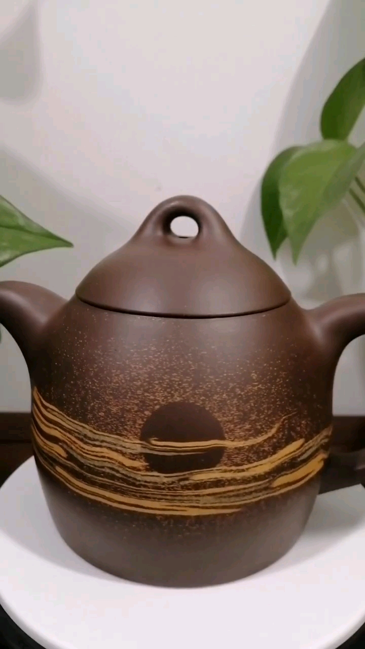 宜兴紫砂绞泥旭日东升秦权壶400cc