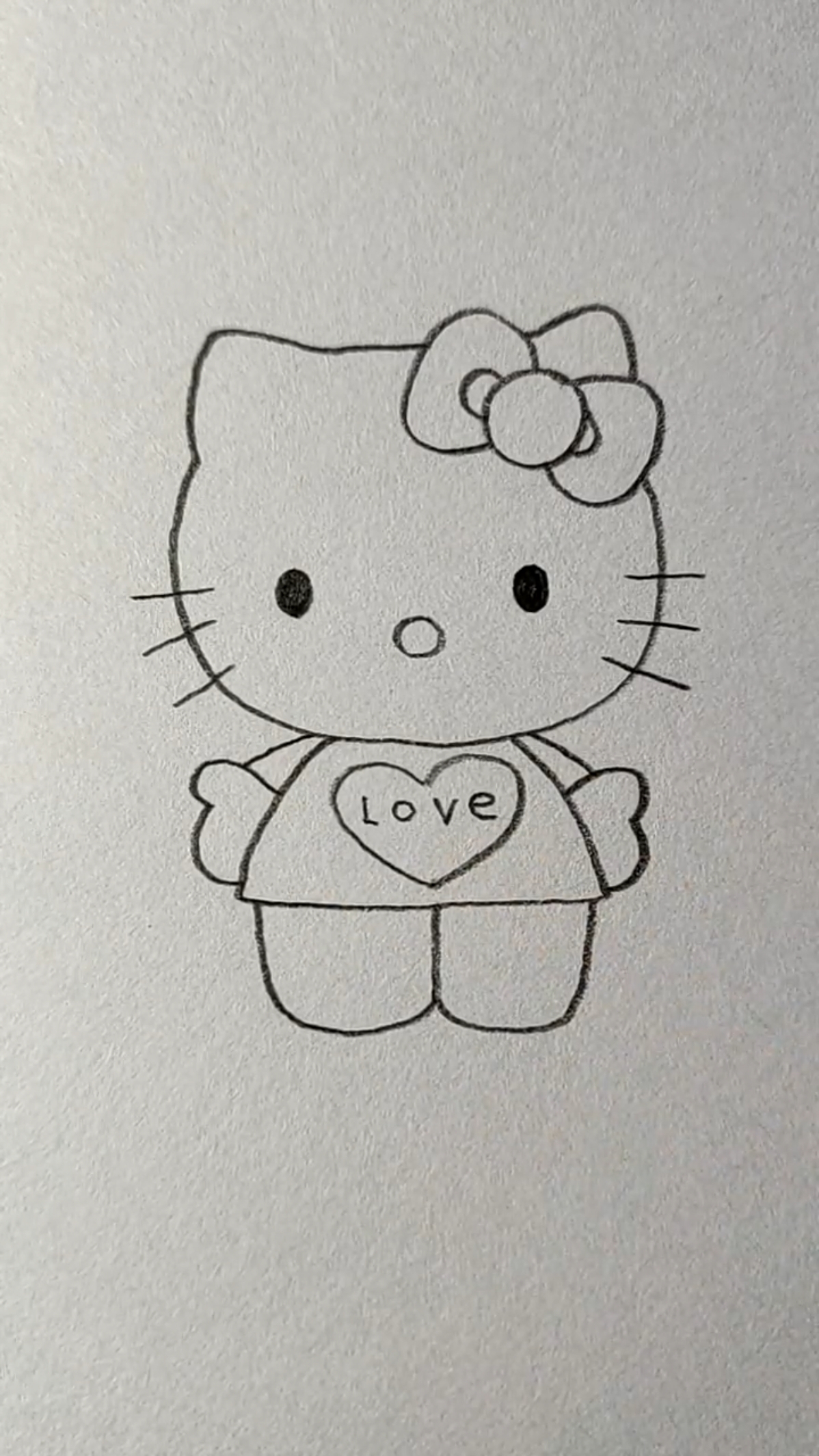 简笔画画一只凯蒂猫,以前上学的时候连作业本都要买凯蒂猫的呢